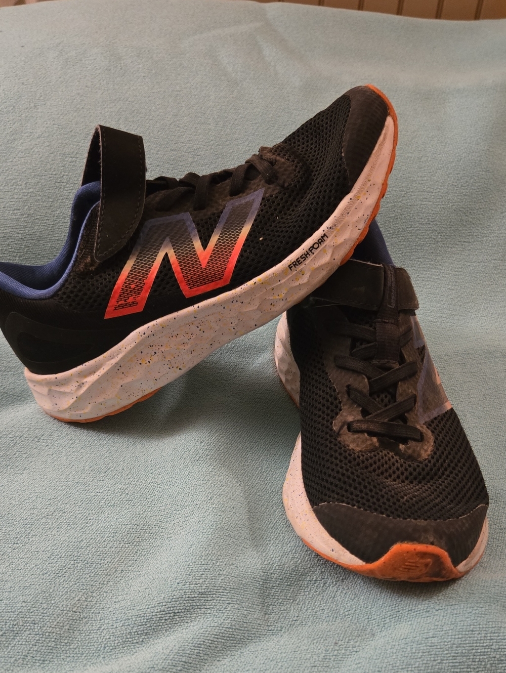 New Balance Kids Black Sneakers with Red-Orange Gradient N